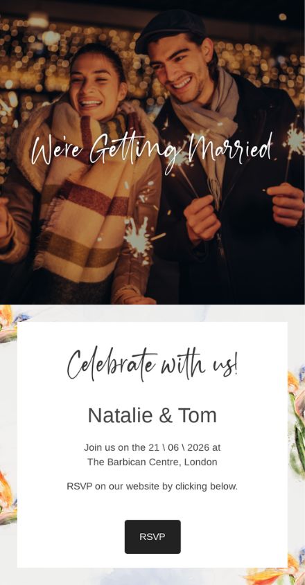 An example of an online wedding invitation with a happy couple with sparkles and a button to RSVP on their wedding website